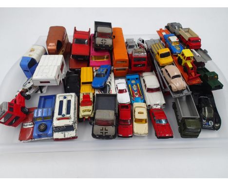 Forty four unboxed Corgi diecast models ranging from playworn to very good condition. UK P&amp;P Group 2 (£20+VAT for the fir