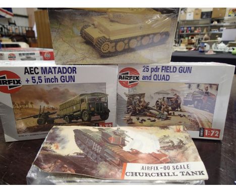 Four Airfix 1/72 scale military related kits, AEC Matador and gun, Tiger tank, field gun and quad, and Churchill tank, sealed