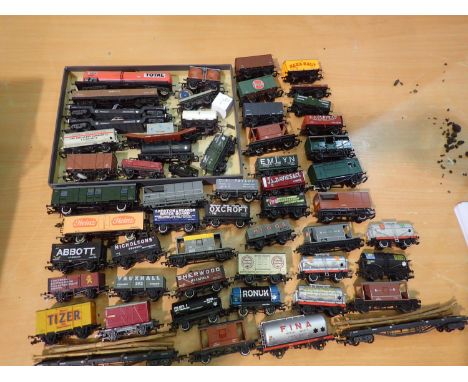 Approximately fifty OO scale unboxed wagons, various makes and types, mostly very good condition. UK P&amp;P Group 2 (£20+VAT