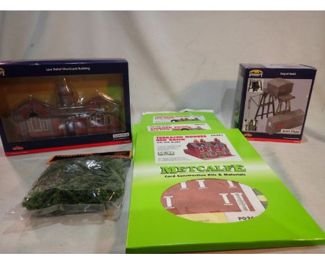 OO scale accessories, Bachmann low relief Municipal building, and depot hoist, plus three Metcalf card kits and trees. UK P&a
