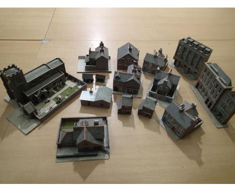 OO scale selection of card built buildings, mostly stone built, including church, houses, shops, including low relief, ex lay