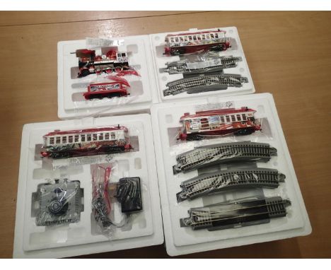 On 16.5 narrow gauge Bachmann/Hawthorne village train set, Spirit of England, 2.6.0 locomotive and tender, three coaches, tra