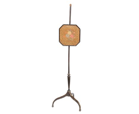  A George III pole screen  , circa 1790,  with an adjustable octagonal floral and foliate petit-point needlework panel, on eb