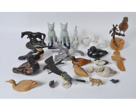 A box of various animal figures, to include ceramic and treen examples 
