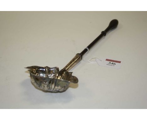 A George II silver toddy ladle, with later floral repousse decoration, London 1759, 32cm 