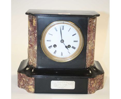 A Victorian black slate and rouge marble eight-day mantel clock, the enamelled dial showing Roman numerals, h.21cm