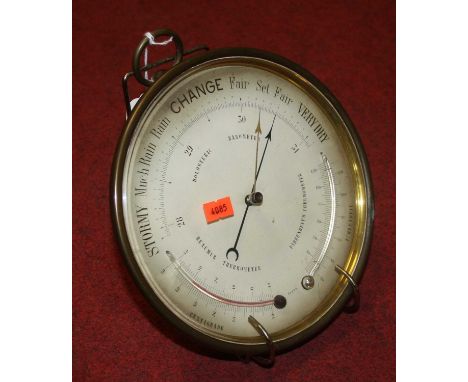 An early 20th century brass cased holosteric barometer and thermometer, dia.21cm 