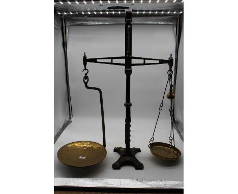 A pair of Todd of Cambridge brass and cast iron beam scales, h.77cm