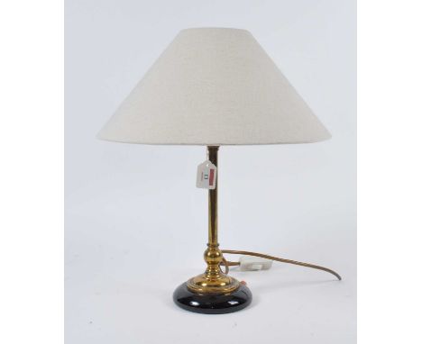 A 20th century brass table lamp, having cream shade, h.46cm 