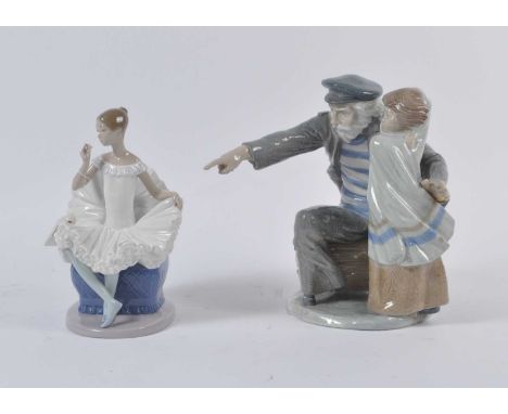 A Nao porcelain figure group of an old man with a little girl, h.29cm; together with another Nao porcelain figure of a seated