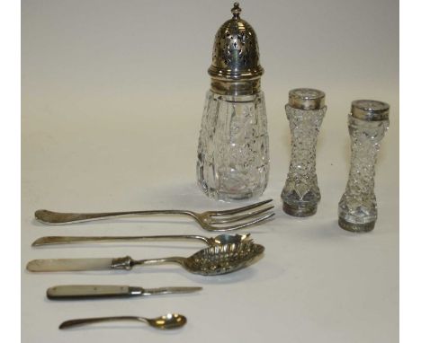 Various silver items, to include a silver lidded cut glass sifter, silver collared knife rests, silver fork etc 