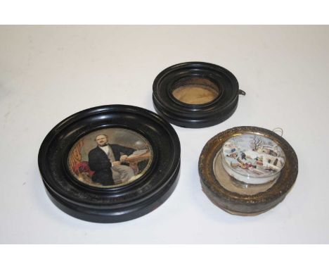 A Victorian Prattware pot lid inscribed The Late Prince Consort, dia.10cm, housed within an ebonised frame; together with ano