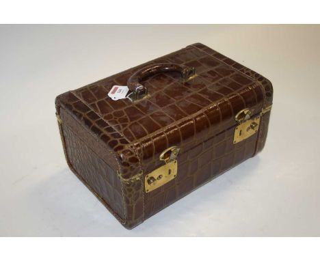 A vintage faux crocodile leather clad travelling bag, w.34.5cm