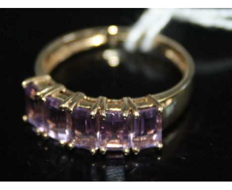 A modern 9ct gold amethyst set half hoop ring, as retailed by QVC, 3.1g, size U