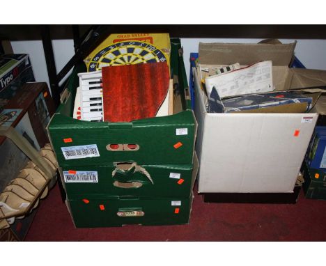 Six boxes of mixed toys and games including miniature dartboard, Scalextric accessories etc