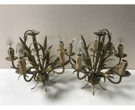 A pair of gilt metal five way light fitting together with a brass and china five way light fitting, a pair of brass and glass