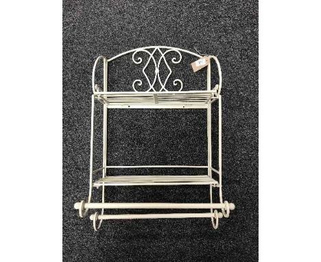 A small folding metal wall shelf 
