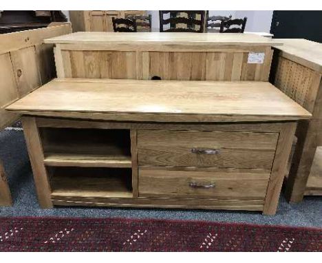 A contemporary light oak sideboard