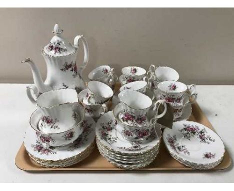 A tray containing a thirty-six piece Royal Albert Lavender Rose tea service
