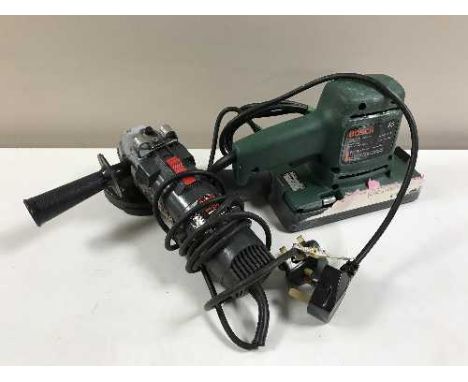 A box of assorted power tools, security lights, gas lamp etc 