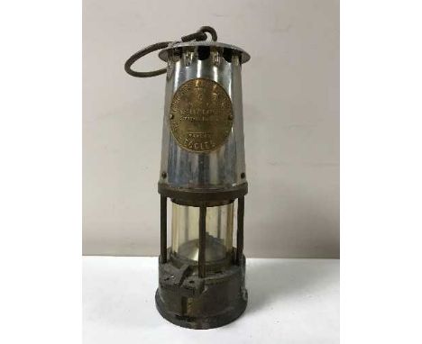 A chrome and brass Eccles Protector miner's lamp Type 6