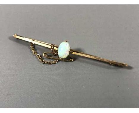 A 15ct gold opal set bar brooch