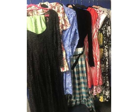 A quantity of vintage lady's clothes - sheepskin coat, dresses, fur coat, handbags etc 