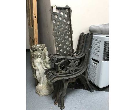 Two sets of cast metal bench ends and a back plate 