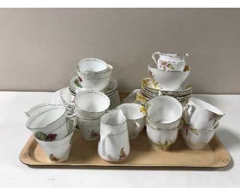 A tray containing a Bell china tea service together with one other
