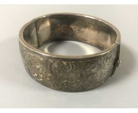 A sterling silver bangle in a Rotary watch box