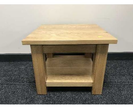 An oak two tier lamp table 