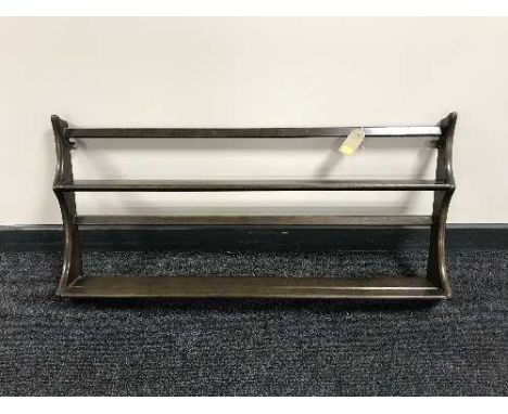 An Ercol plate rack 