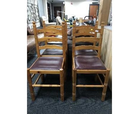 Four pine ladder back chairs 