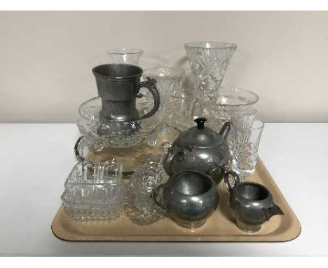 A tray of assorted cut glass and crystal vases, pewter tea service, pewter tankard etc 