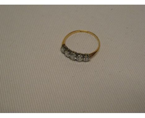 An 18ct gold engagement ring set five graduated diamonds