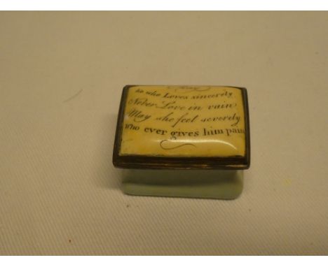 A late 18th/early 19th century rectangular enamelled patch box with mirror interior, the hinged lid marked "May He Who Loves 