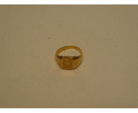 An 18ct gold signet ring with engraved initials 