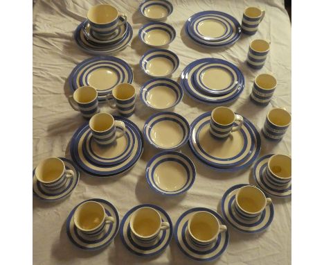 A selection of T.G. Green "Clover Leaf" Cornish kitchen ware including various mugs, tea cups, saucers, six dessert bowls, fi