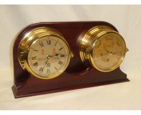 A good quality modern nautical-style clock and barometer set by S. E. Wills of Liverpool "Maker to the Admiralty" mounted on 