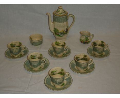 A Royal Doulton china coffee set with figures in a landscape decoration comprising coffee pot, cream jug, sugar bowl, six cof