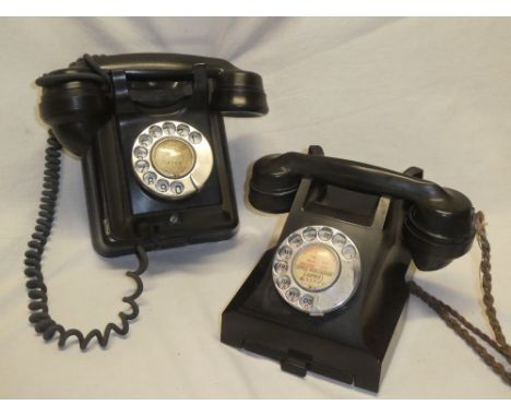 An old vintage black wall mounted telephone and one other vintage telephone (2)