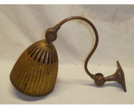 An Edwardian copper and brass mounted adjustable desk/wall lamp with fluted brass shade 14" long