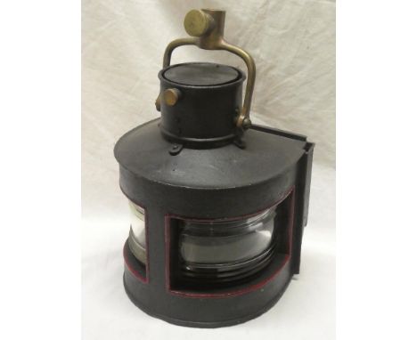 A painted metal and brass mounted ship's lamp with ribbed glass lenses and oil fitment 14" high