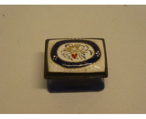 A late 18th/early 19th century enamelled rectangular patch box with mirror interior, the decorated hinged lid marked "Remembe