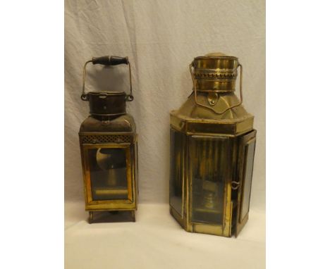 An old brass ship's rectangular hanging oil lamp fitment with swing handle and one other brass ship's-style lamp (2)