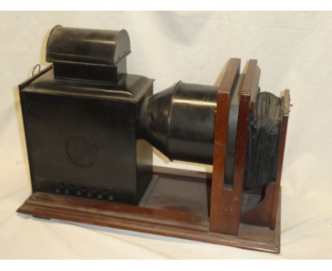 An old mahogany and painted metal magic lantern slide projector (minus lens)