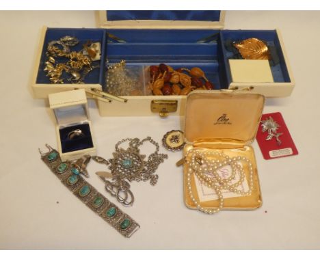 A jewellery box containing a quantity of various costume jewellery including pearl necklace with 9ct gold clasp, silver dress