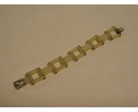 A 14ct white gold mounted jade rectangular link bracelet
