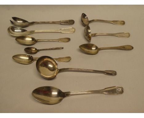 A selection of French mainly silver table cutlery including fiddle pattern serving spoon with scallop handle, matching sauce 