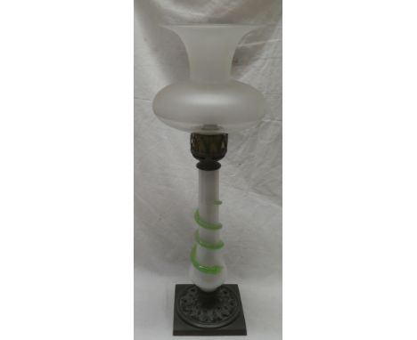 A William IV/early Victorian candle lamp by Palmer &amp; Co. with snake decorated opaque glass stem and ornate brass base sup